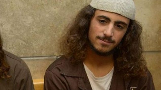 ينون رئوفيني، المشتبه بتخريب كنيسة ’الخبز والسمك’ في التابغة، على ضفاف بحيرة طبريا، في المحكمة المركزية في الناصرة، 29 يوليو، 2015. ( Basel Awidat/Flash90) ينون رئوفيني، المشتبه بتخريب كنيسة ’الخبز والسمك’ في التابغة، على ضفاف بحيرة طبريا، في المحكمة المركزية في الناصرة، 29 يوليو، 2015. ( Basel Awidat/Flash90)