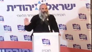 الحاخام يهوشواع شابيرا، رئيس المعهد الديني رمات غان، يتحدث أمام مؤتمر لأتباع تيار اليمين المتدين في 6 مارس، 2018. (لقطة شاشة:Ynet)