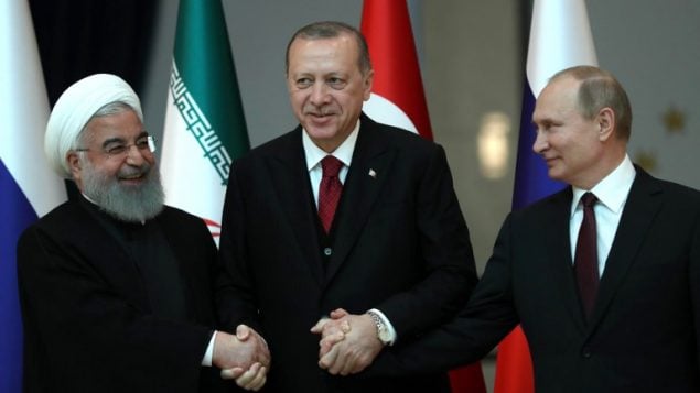 الرؤساء التركي رجب طيب اردوغان والروسي فلاديمير بوتين والايراني حسن روحاني قبل مشاورات في القصر الرئاسي في انقرة، 4 ابريل 2018 (TOLGA BOZOGLU / POOL / AFP) الرؤساء التركي رجب طيب اردوغان والروسي فلاديمير بوتين والايراني حسن روحاني قبل مشاورات في القصر الرئاسي في انقرة، 4 ابريل 2018 (TOLGA BOZOGLU / POOL / AFP)