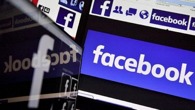 توضيحية: شعار موقع التواصل الاجتماعي فيسبوك.  (AFP Photo/Loic Venance)
