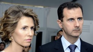 الرئيس السوري بشار الاسد وزوجته، اسماء الاسد، يوليو 2010 (AP/Hassene Dridi)