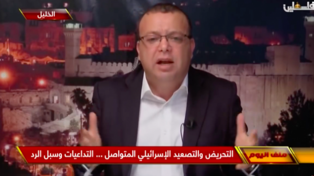 المتحدث باسم فتح أسامة القواسمة يتحدث إلى تلفزيون فلسطين، القناة الرسمية الفلسطينية، في 13 ديسمبر ، 2018. (لقطات شاشة: يوتيوب)