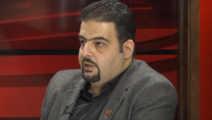 عضو مجلس مدينة حيفا رجا زعاترة من القائمة العربية المشتركة. (لقطة شاشة: يوتيوب)