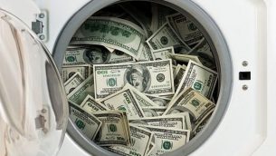 صورة توضيحية: غسيل الأموال (iStock)