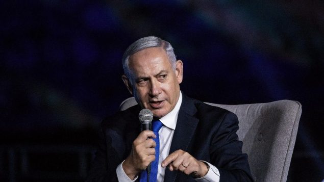 رئيس الوزراء بنيامين نتنياهو يتحدث خلال مؤتمر لصحيفة ’يسرائيل هايوم’ في القدس، 27 يونيو 2019 (Aharon Krohn/Flash90)