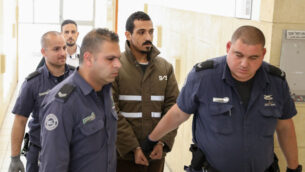 Sand Al-Turman, the suspect in a car-ramming attack which injured a dozen soldiers near the Jerusalem First Station a few weeks ago, seen at the District Court in Jerusalem on March 11, 2020. Photo by Olivier Fitoussi/Flash90 *** Local Caption *** פינוי
פצוע
חייל
פיגוע דריסה
פלסטיני
ירושלים
הערכת מעצר
סנד אל-טורמאן
דריסה
חיילים