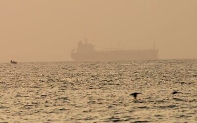 The oil tanker Mercer Street, which came under attack last week off Oman, is seen moored off Fujairah, United Arab Emirates, Wednesday, Aug. 4, 2021. The British navy warned of a "potential hijack" of another ship off the coast of the United Arab Emirates in the Gulf of Oman on Tuesday, though the circumstances remain unclear. (AP Photo/Jon Gambrell)