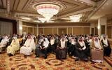عراقيون يحضرون مؤتمر السلام والاسترداد الذي نظمه مركز اتصالات السلام الأمريكي (CPC) في أربيل، عاصمة إقليم كردستان شمال العراق، 24 سبتمبر، 2021. (Safin HAMED / AFP)