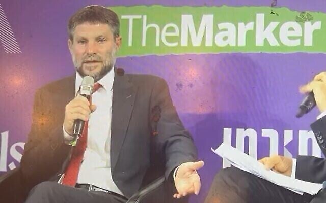 وزير المالية والوزير في وزارة الدفاع بتسلئيل سموتريتش يتحدث في مؤتمر استضافته صحيفة The Marker في 1 مارس، 2023. (Screenshot: Twitter; Used in accordance with Clause 27a of the Copyright Law) وزير المالية والوزير في وزارة الدفاع بتسلئيل سموتريتش يتحدث في مؤتمر استضافته صحيفة The Marker في 1 مارس، 2023. (Screenshot: Twitter; Used in accordance with Clause 27a of the Copyright Law)