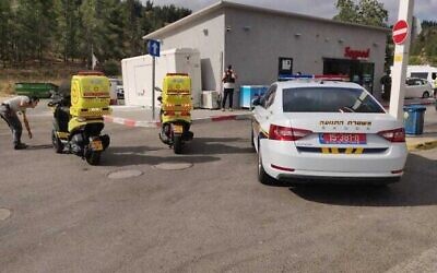 First responders at the scene of a shooting attack at a gas station near the West Bank settlement of Eli on June 20, 2023. (Magen David Adom)