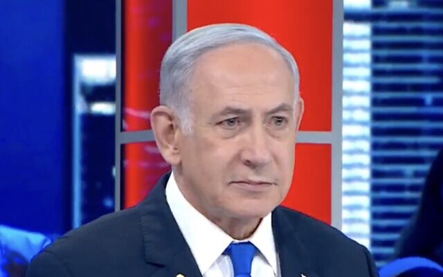 رئيس الوزراء بنيامين نتنياهو يتحدث مع القناة 14 في أول مقابلة تجريها معه وسيلة إعلام إسرائيلية منذ 7 أكتوبر، 23 يونيو، 2024. (Screenshot, Channel 14, used in accordance with Clause 27a of the Copyright Law) رئيس الوزراء بنيامين نتنياهو يتحدث مع القناة 14 في أول مقابلة تجريها معه وسيلة إعلام إسرائيلية منذ 7 أكتوبر، 23 يونيو، 2024. (Screenshot, Channel 14, used in accordance with Clause 27a of the Copyright Law)