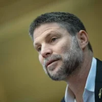 وزير المالية بتسلئيل سموتريتش يحضر اجتماع كتلة "أرض إسرائيل" في الكنيست في القدس، 9 مارس، 2025. (Yonatan Sendel/Flash 90)