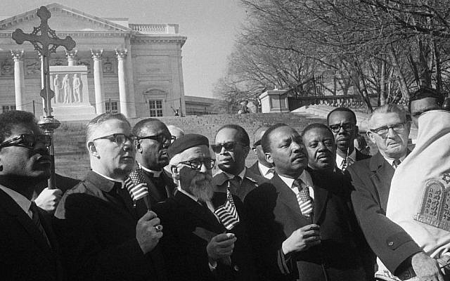 Illustrative: Leaders in a Vietnam war protest stand in silent prayer in Arlington National Cemetery, February 6, 1968, including Rabbi Abraham Heschel, and the Rev. Dr. Martin Luther King Jr. (AP Photo/Harvey Georges)