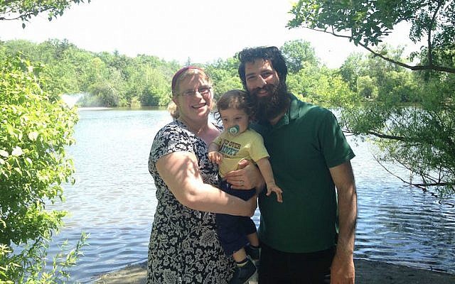 Sam Zerin, with his wife Rabbi Rachel Zerin and their son, said the JCC bomb threats recalled an anti-Semitic threat his middle school received when he was 13. (Courtesy of Zerin family via JTA)