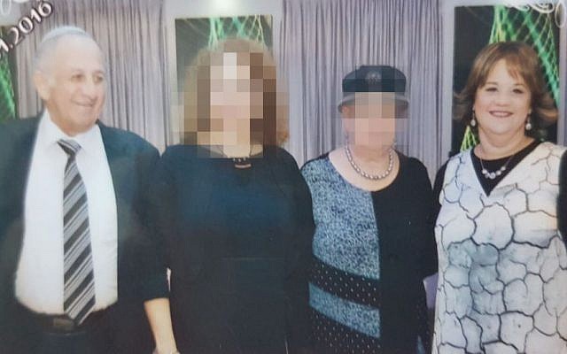 Yosef Salomon, 70, his daughter Chaya Salomon, 46, seen at a recent family celebration. They were stabbed to death on July 21, 2017 in a terrorist attack at Halamish. (Courtesy)