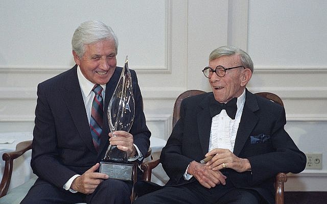 Monty Hall, left, recipient of the 2nd Annual George Burns Lifetime Award, laughs with George Burns at the United Jewish Fund tribute to humanitarian Hall, in the Century City section of Los Angeles, on March 14, 1993.(AP Photo/Julie Markes, File)