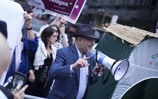 Rabbis marching for immigrants’ rights outside the Trump Tower in New York, October 9, 2017. (Courtesy of T’ruah)