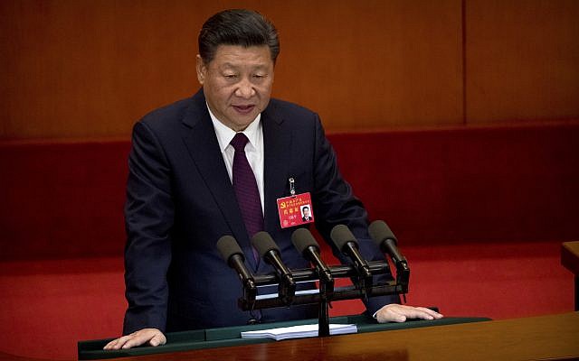 Chinese President Xi Jinping delivers a speech during the opening session of China's 19th Party Congress at the Great Hall of the People in Beijing, Wednesday, Oct. 18, 2017. (AP Photo/Mark Schiefelbein)