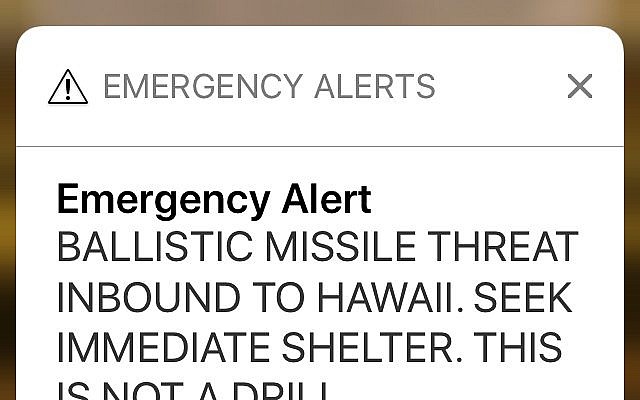 This smartphone screen capture shows a false incoming ballistic missile emergency alert sent from the Hawaii Emergency Management Agency system on Saturday, Jan. 13, 2018. (AP Photo/Caleb Jones)