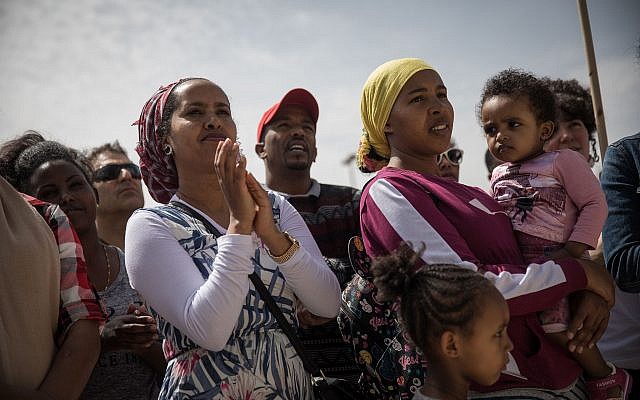 African asylum seekers and Israeli activists protest outside the Prime Minister's Office in Jerusalem, against their deportation, on April 3, 2018. (Hadas Parush/Flash90)