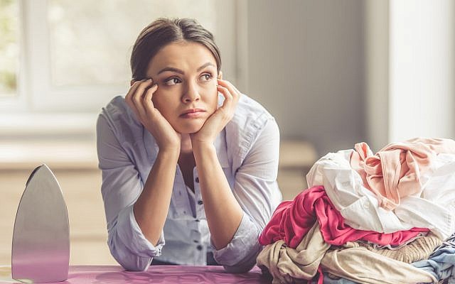 Illustrative. A woman avoiding the housework. (iStock)