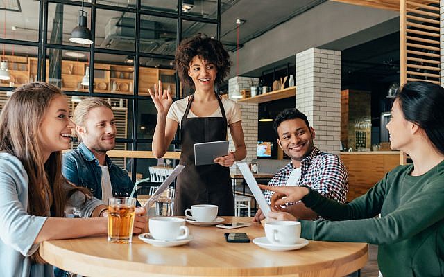 Illustrative. Appreciating a waiter. (iStock)