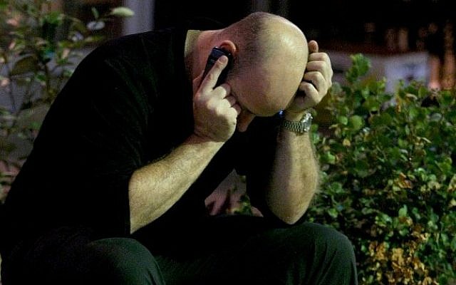 Illustrative photo of a man on his cell phone (photo credit: Moshe Shai/FLASH90)