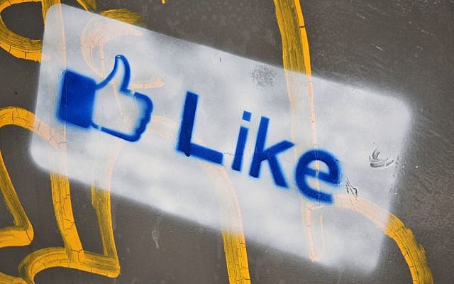Facebook graffiti in Jerusalem (photo credit: Gordon/Flash 90)