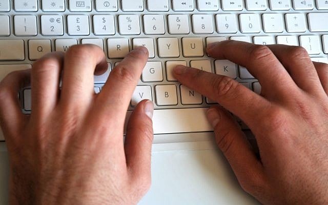 Typing on a computer (Sophie Gordon/Flash 90)