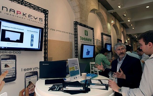 Start-ups display their technologies at a high-tech event in Jerusalem (Photo credit: Kobi Gideon / Flash90)