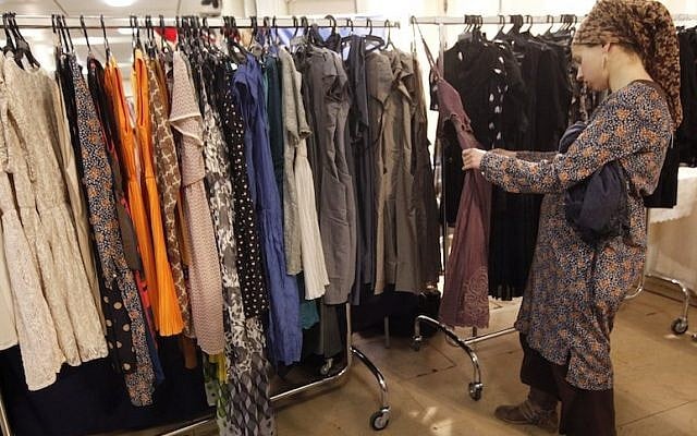 A woman shops for clothes in Jerusalem (Photo credit: Miriam Alster/FLASH90)