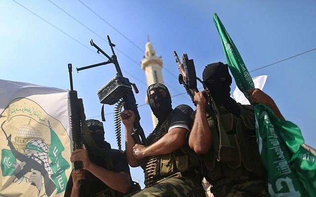 Hamas militants take part in a march in the streets of Gaza City to mark the first anniversary of the Shalit deal. October 18, 2012 (photo credit: Wissam Nassar/Flash90) Hamas militants take part in a march in the streets of Gaza City to mark the first anniversary of the Shalit deal. October 18, 2012 (photo credit: Wissam Nassar/Flash90)