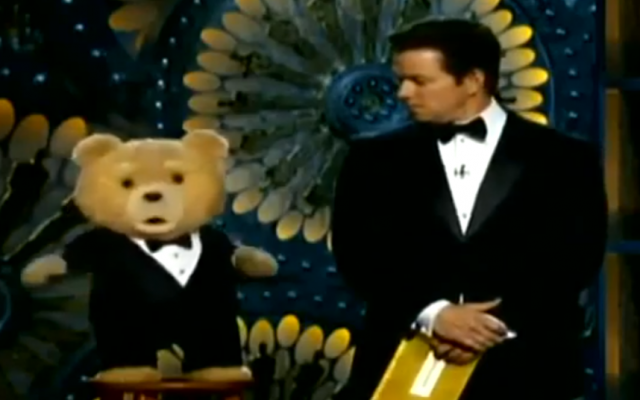 The puppet star of "Ted" claimed he was Jewish at Sunday's Oscars, and co-presenter Mark Wahlberg called him an "idiot." (YouTube screenshot) The puppet star of "Ted" claimed he was Jewish at Sunday's Oscars, and co-presenter Mark Wahlberg called him an "idiot." (YouTube screenshot)