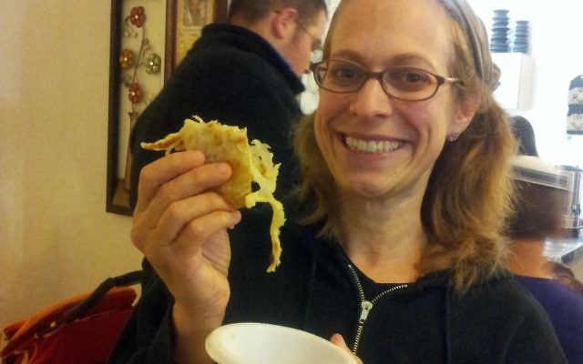 Enjoying a mufleta at a Mimouna celebration