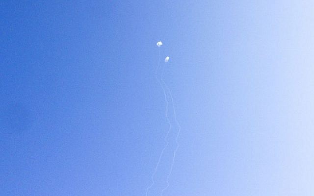 Smoke seen after the Iron Dome missile system intercepted a Katyusha rocket fired from Lebanon into northern Israel, August 22, 2013. (photo credit: Kobi Snir/Flash90)