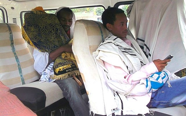 The Torah scroll from Gondar synagogue being taken to the Israeli consulate.