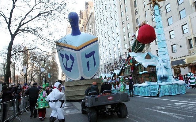 Illustrative: A dreidel balloon is paraded down Central Park South as part of the Macy's Thanksgiving Day Parade, November 28, 2013. (AP/Tina Fineberg) Illustrative: A dreidel balloon is paraded down Central Park South as part of the Macy's Thanksgiving Day Parade, November 28, 2013. (AP/Tina Fineberg)