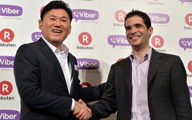Rakuten president Hiroshi Mikitani (L) shakes hands with Viber Media CEO Talmon Marco in Tokyo on February 14, 2014. (Photo credit: Yoshikazu Tsuno/AFP) Rakuten president Hiroshi Mikitani (L) shakes hands with Viber Media CEO Talmon Marco in Tokyo on February 14, 2014. (Photo credit: Yoshikazu Tsuno/AFP)