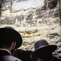 Jewish worshipers at the underground tomb of Mishnaic-era scholar, R' Yehuda Bar Ilai, near Safed, Israel.