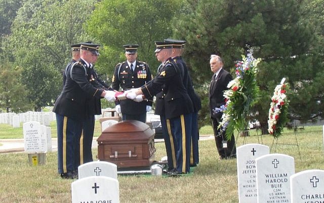 An Army Casket team lays to rest Pfc. Bernard Gavrin at Arlington National Cemetery on September 12 2014 while Rabbi Marvin Bash looks on (Photo credit: Ron Kampeas/JTA)