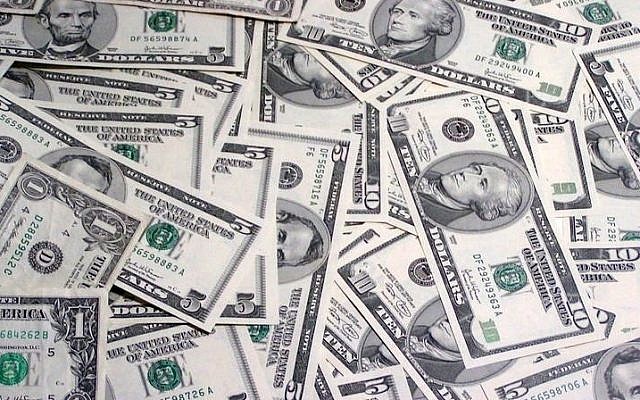 Illustrative. US dollar bank notes (CC BY-SA Manuel Dohmen/Wikimedia Commons)