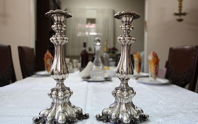 Illustrative. Shabbat candlesticks. (Yaakov Naumi/Flash90)