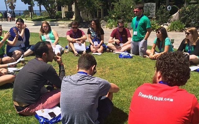 At a StandWithUs Emerson Fellowship training in Los Angeles in late August, students discuss the Iran deal and how to bring it to campus. (courtesy)