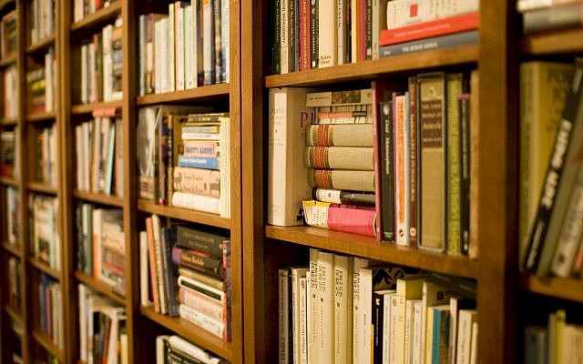 Illustrative photo of shelves filled with books. (CC BY 2.0 Stewart Butterfield/Wikipedia)