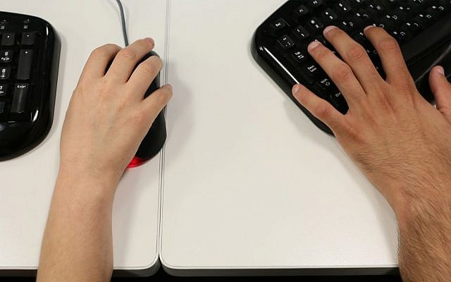 Illustrative photo of people using computers. (Nati Shohat/Flash90)