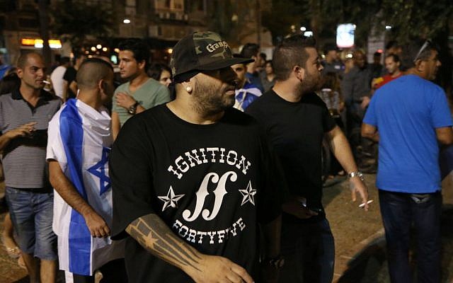 Israeli rap singer Yoav Eliasi takes part at a right wing demonstration in support of Israel's offensive in the Gaza Strip, in Tel Aviv, Israel, August 9, 2014. (Flash90)