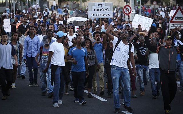 Hundreds of Israeli-Ethiopians protest outside the Police Headquarters in Jerusalem, against violence and racism directed at Israelis of Ethiopian descent, following release of a video clip showing police beating up an IDF soldier from the Ethiopian community. April 30, 2015. (FLASH90/Hadas Parush)