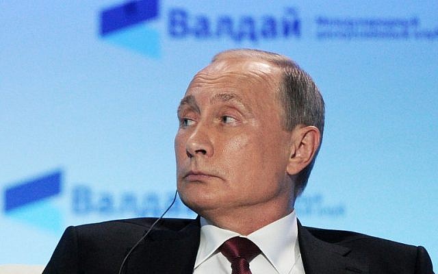 Russian President Vladimir Putin attends a Valdai Discussion Club meeting of political scientists in Sochi on October 27, 2016. (AFP PHOTO / SPUTNIK / Mikhail KLIMENTYEV)