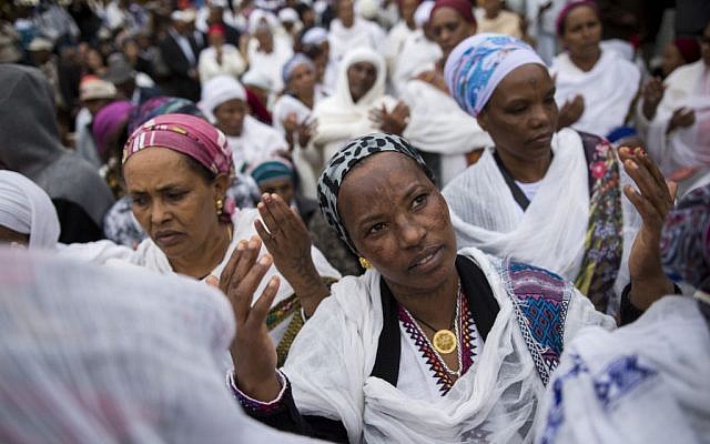 Illustrative: Ethiopian Israelis take part in a prayer service for the Sigd holiday on the Armon Hanatziv Promenade in Jerusalem on November 30, 2016. (Photo by Miriam Alster/Flash90) Illustrative: Ethiopian Israelis take part in a prayer service for the Sigd holiday on the Armon Hanatziv Promenade in Jerusalem on November 30, 2016. (Photo by Miriam Alster/Flash90)