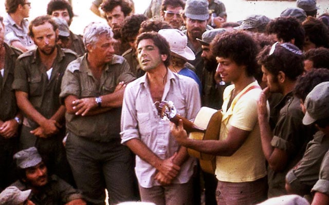 Leonard Cohen entertaining IDF troops during the Yom Kippur War in 1973.  Photo (c) IDF, 2022